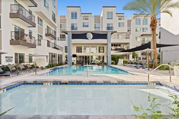 Three pools with sun veils & misted courtyard